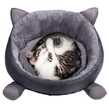 Cat head plush cat sleeper bed.