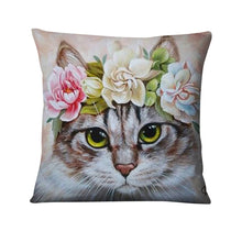 a cat with a flower hat on its head 