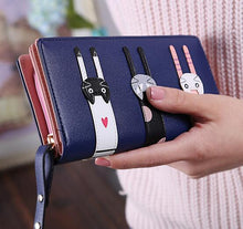 Mobile phone cat three cat wallet. Pick your choice of colors from pink, black, baby blue, and navy.